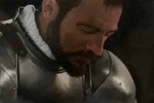 Biagio, Il soggetto è rappresentato con lo sguardo rivolto verso il basso e un'espressione solenne e pensierosa. Ha una folta barba e baffi, i suoi capelli scuri sono visibili nella parte superiore del dipinto. Indossa un'armatura, da cui spunta un colletto bianco che spicca sullo sfondo scuro.